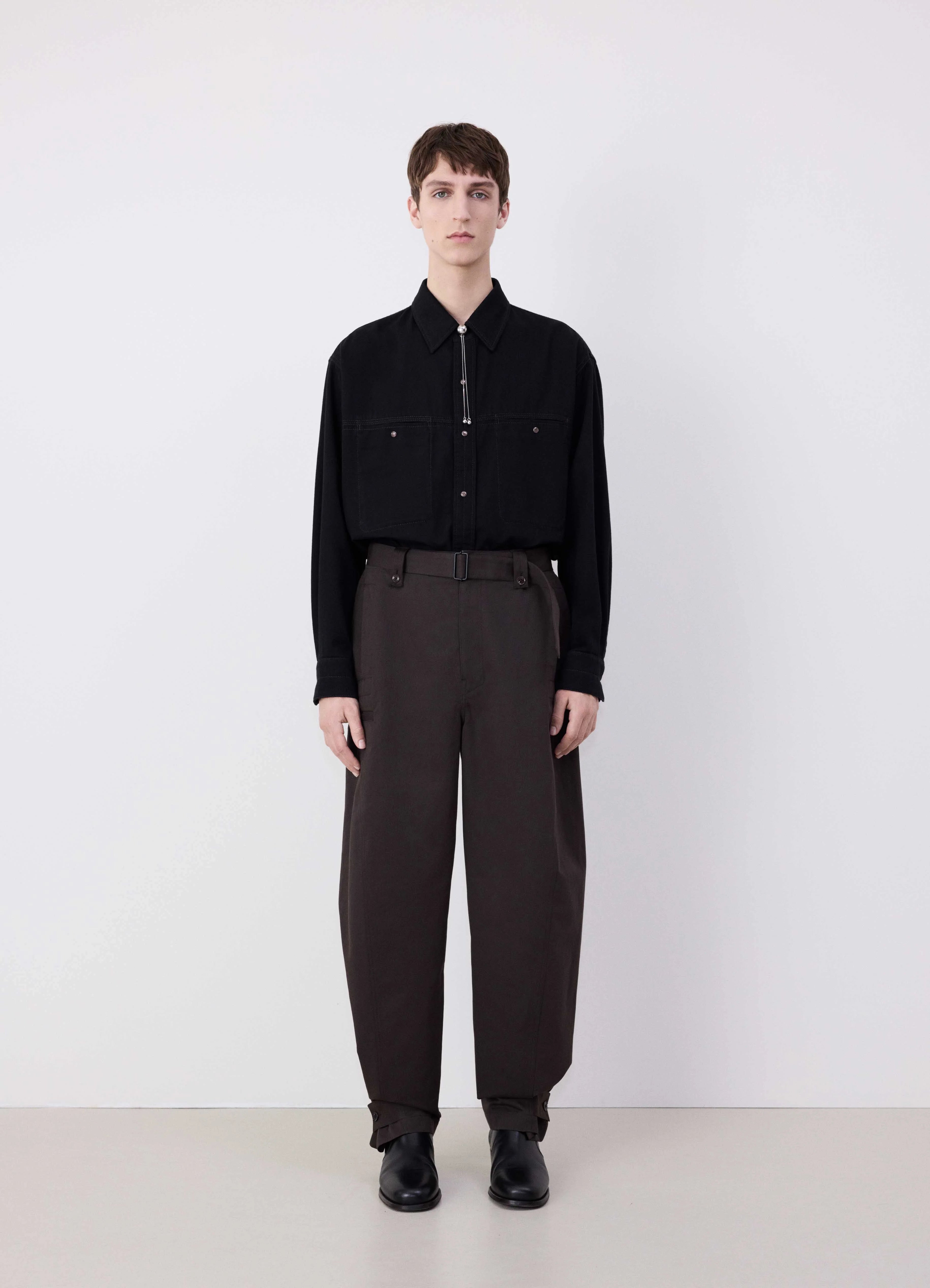 Upgrade your wardrobe with stylish clothing at discounted prices. TWISTED PANTS WITH ADJUSTABLE CUFF Upgrade your wardrobe with stylish clothing at discounted prices. TWISTED PANTS WITH ADJUSTABLE CUFF
