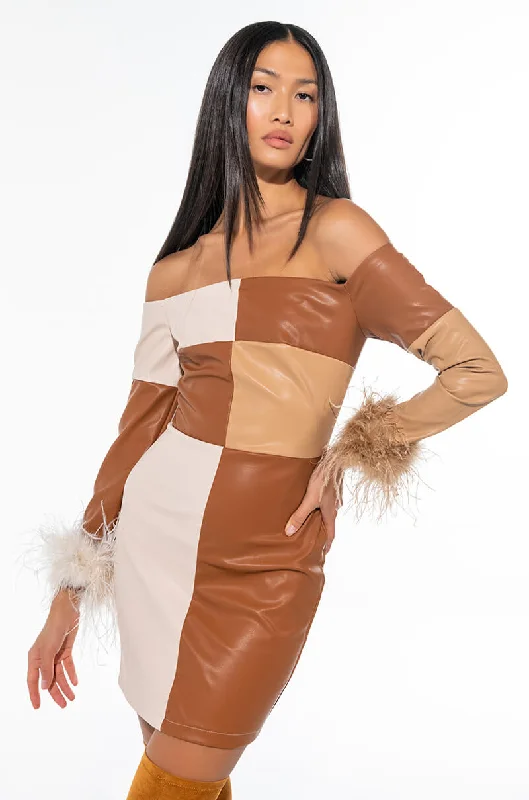Bold, confident, and stylish women’s clothing   CHECK HER OUT REAL FEATHER PU MINI DRESS