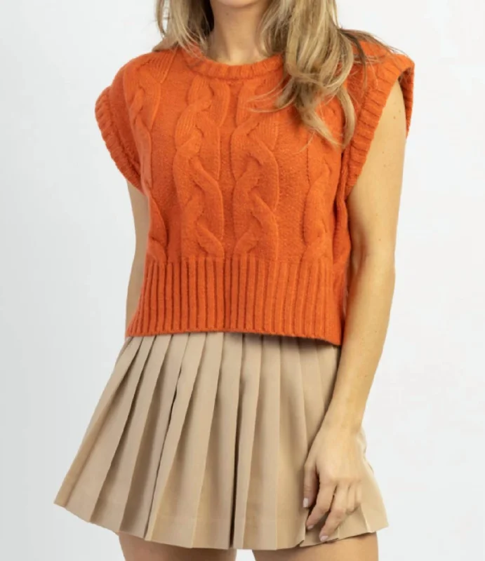 Limited-time promo – up to 70% off on men's essentials.  Aperol Cable Sweater Tank In Orange