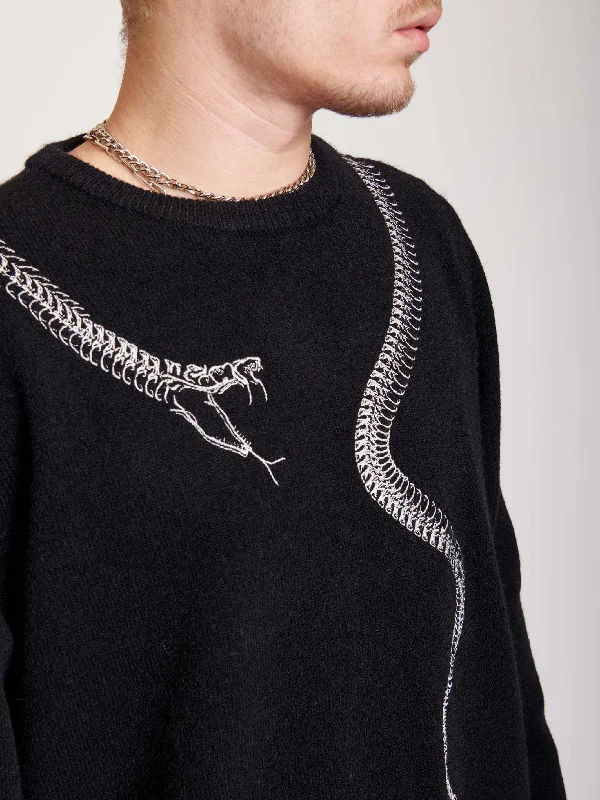 Shop the best  fashion at prices you can’t beat.  Embroidered Snake Sweater