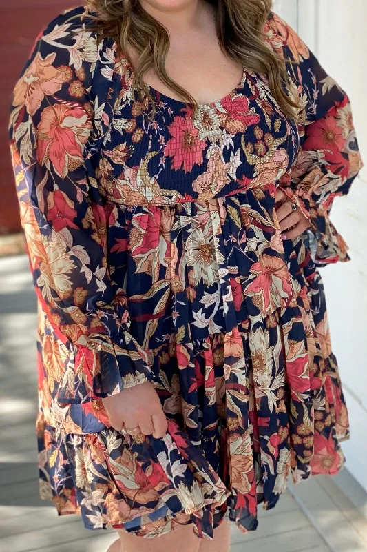 Dress up or down with these versatile pieces   Plus Size Smocked Printed Long Sleeve Dress