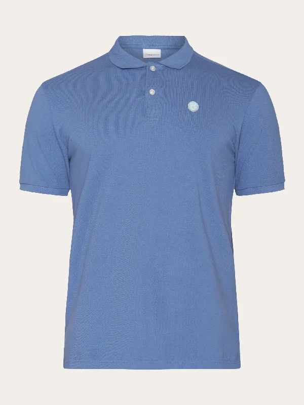 Save big on men’s casual wear – today only!  Basic badge polo - Moonlight Blue