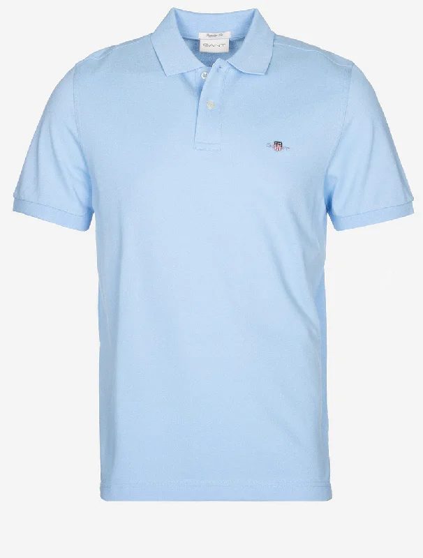 Shop online now for exclusive savings on men’s  clothing.  Regular Shield Short Sleeve Pique Polo Capri Blue