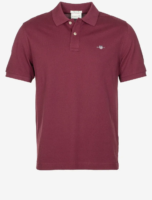 Save big on men’s casual wear – today only!  Regular Shield Short Sleeve Pique Polo Wine Red