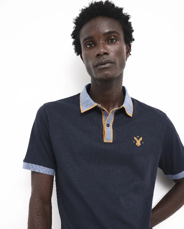 Flash discounts – men’s clothing essentials for less.  Rare Rabbit Men's Lark Navy Contrasting Collar And Half Sleeves Regular Fit Plain Knitted Polo T-Shirt