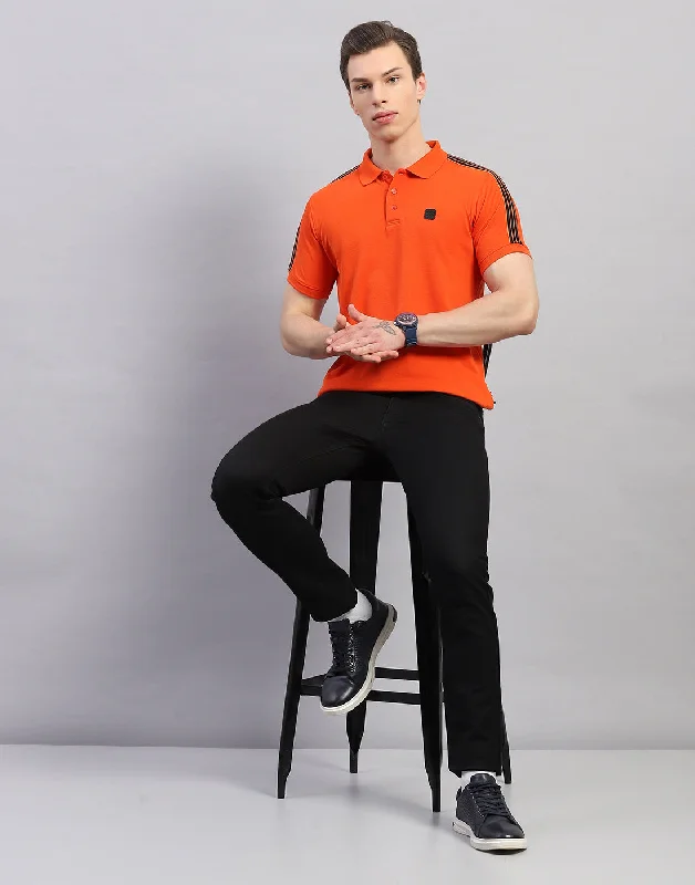 Get fresh fashion for less – Shop trendy clothing at discounted prices.  Men Orange Solid Polo Collar Half Sleeve T-Shirt